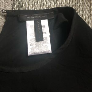 BCBG MaxAzria silk top with split back hem size L